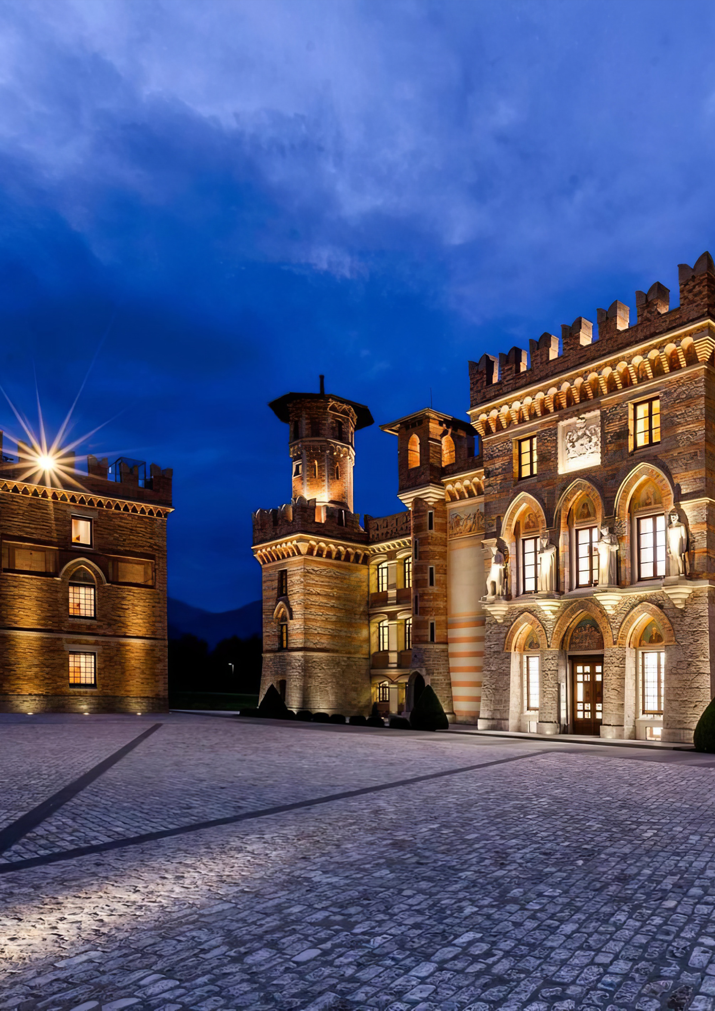 Castello Ceconi illuminated at blue hour